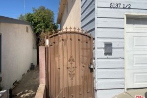Front gate of a house in brown color